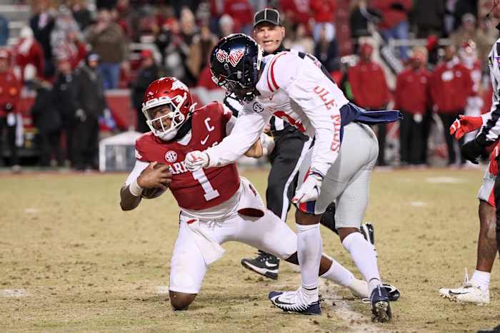 Ole Miss Rebels safety Otis Reese IV hits Arkansas Razorbacks quarterback KJ Jefferson in the backfield (2022).